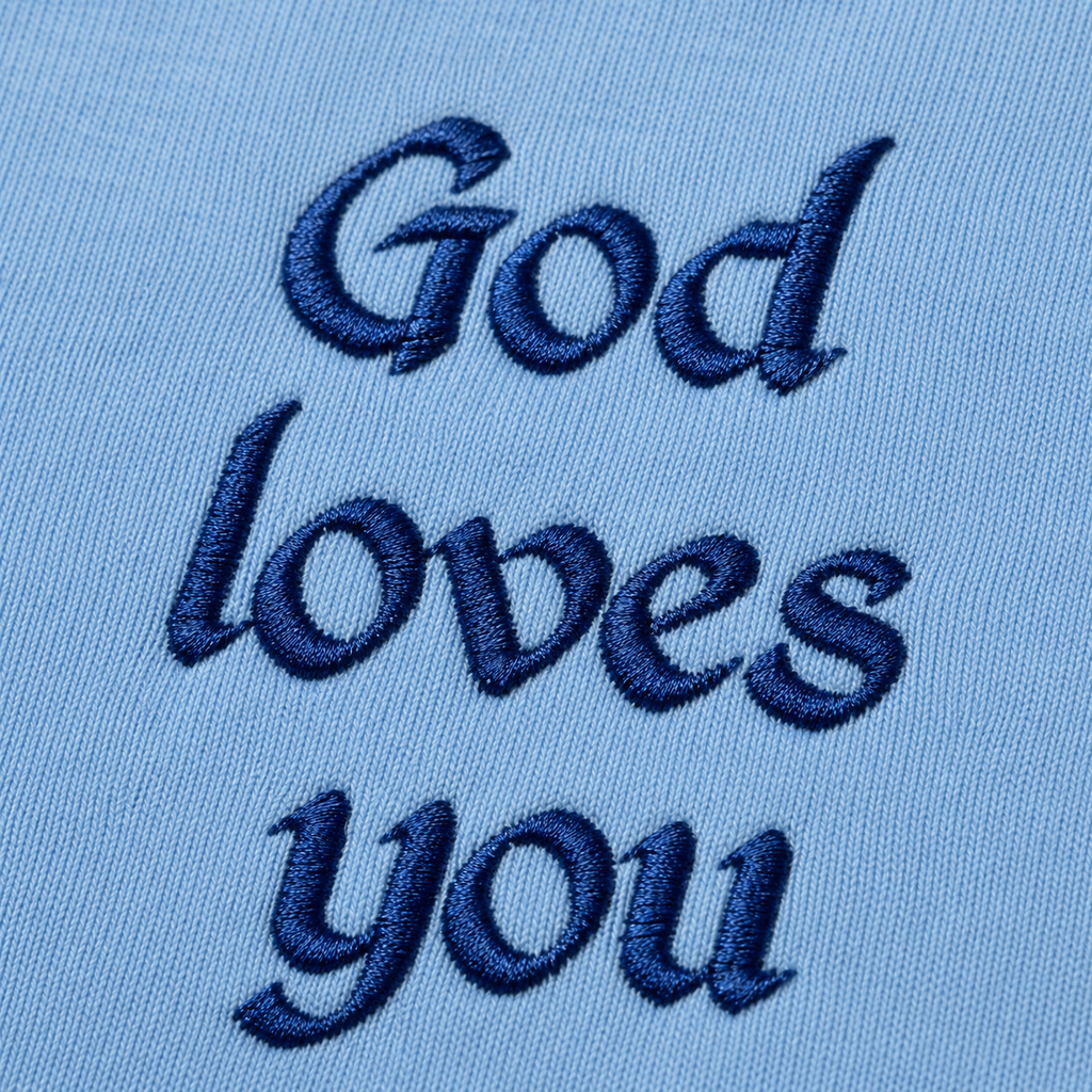"God Loves You" Embroidered Apron — Sky Blue | Kingdom Wear UK